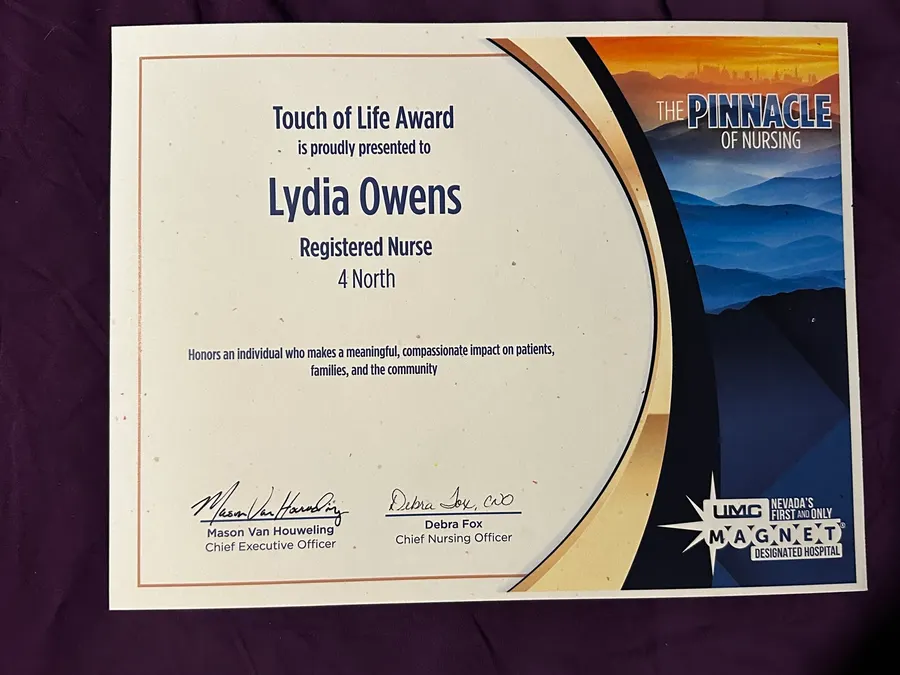 Touch of Life Award certificate presented to Lydia Owens, Registered Nurse, 4 North, by University Medical Center of Southern Nevada.